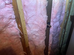 Removed this section of wall in an attic where a bat colony was living and cleaned out all the very big mess these bats made along with removing all the old insulation from the way and then installing new insulation once it was all cleaned and disinfected and all bats were out the home and any and all entryways were sealed up and repaired to keep the bats from entering this home again in Debordieu